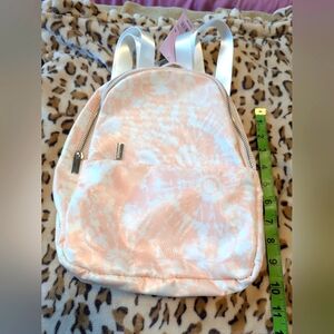 A new day tie dye small backpack. NWT peach white